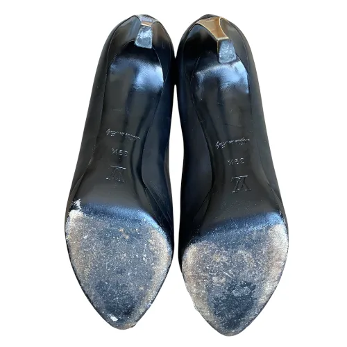 LOUIS VUITTON Black Leather Gold Logo Zip & Heel Pointed Toe Ankle Boots, 39.5